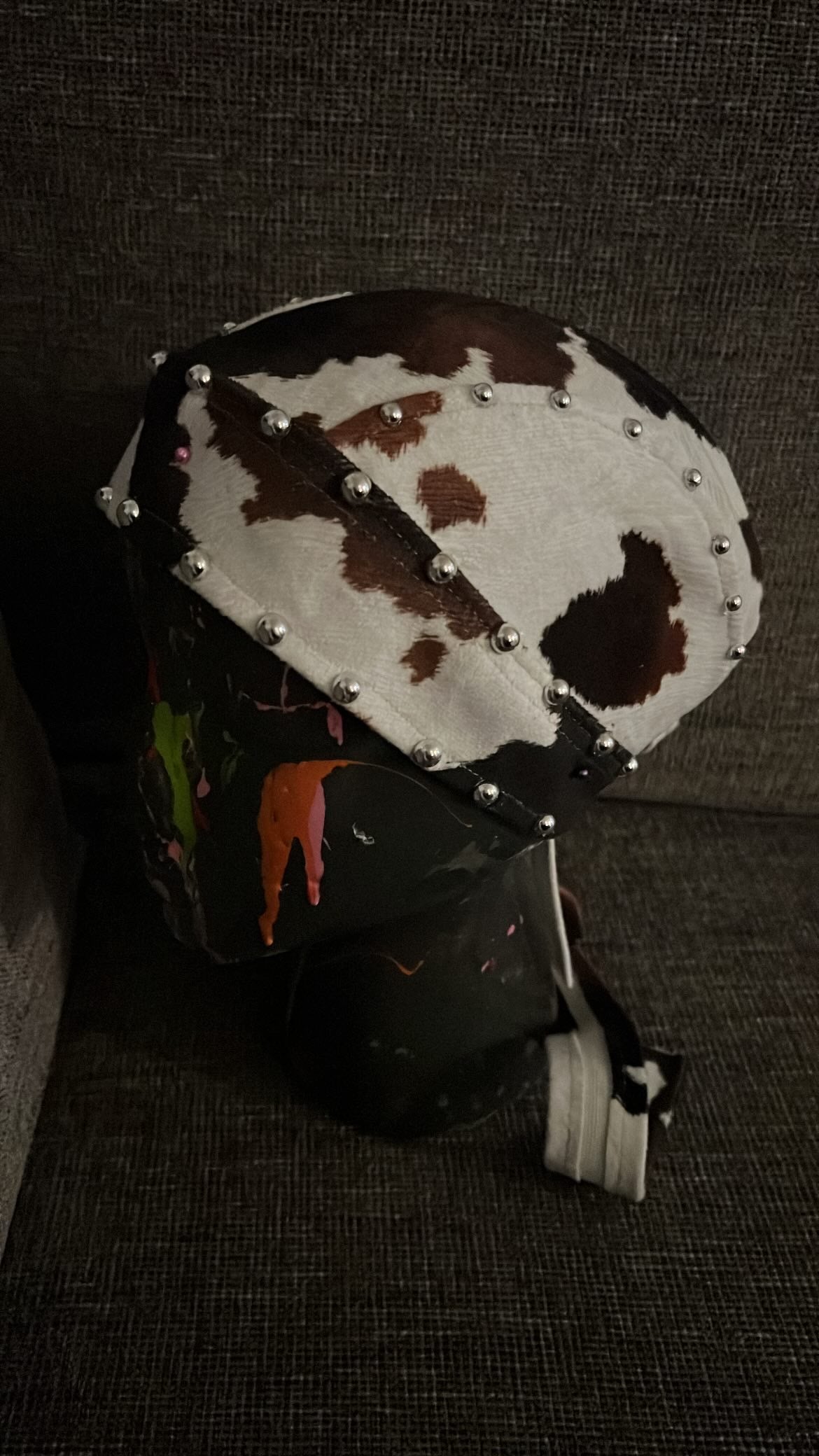 Faux cow hide studded biker cap